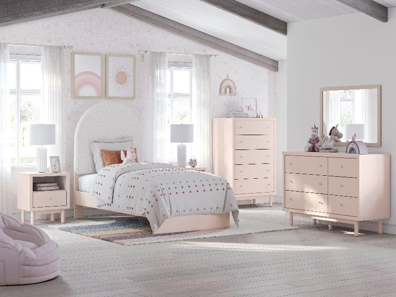 Image of Wistenpine - 7 Pc. - Dresser, Mirror, Chest, Twin Upholstered Panel Bed - Blush