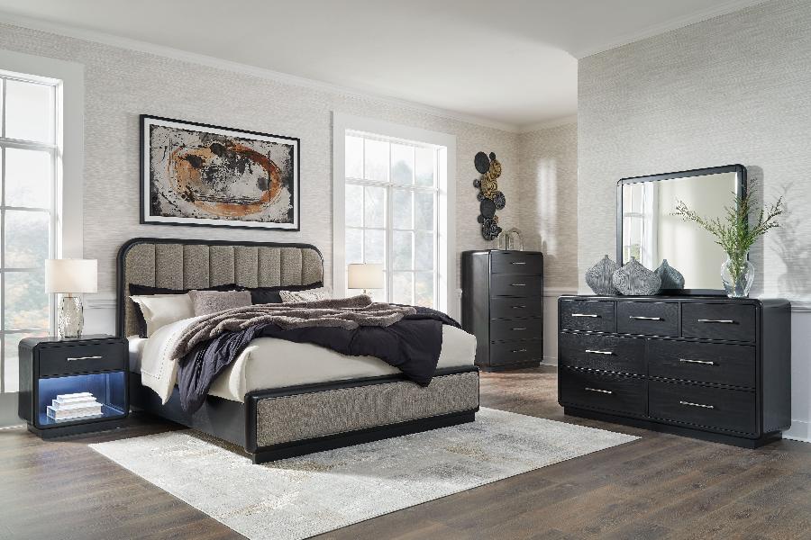 Image of Rowanbeck - 7 Pc. - Dresser, Mirror, Chest, King Upholstered Panel Bed, 2 Nightstands - Gray / Black