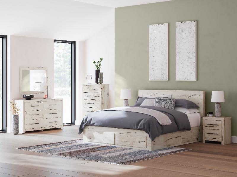 Image of Lawroy - 8 Pc. - Dresser, Mirror, Chest, King Panel Bed With Storage Footboard And 2 Under Bed Storage Units - Light Natural