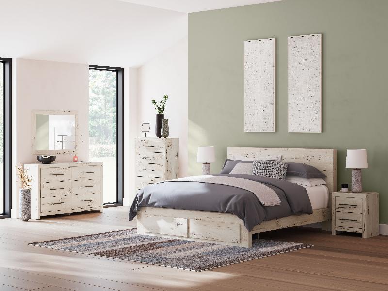 Image of Lawroy - 7 Pc. - Dresser, Mirror, Chest, King Panel Bed With Storage Footboard - Light Natural