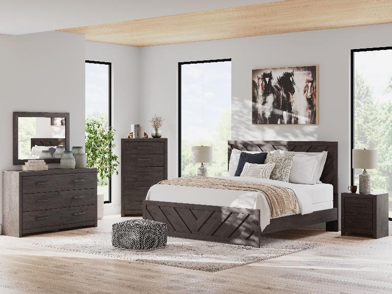 Image of Prendonea - 7 Pc. - Dresser, Mirror, Chest, King Panel Bed, 2 Nightstands - Charcoal