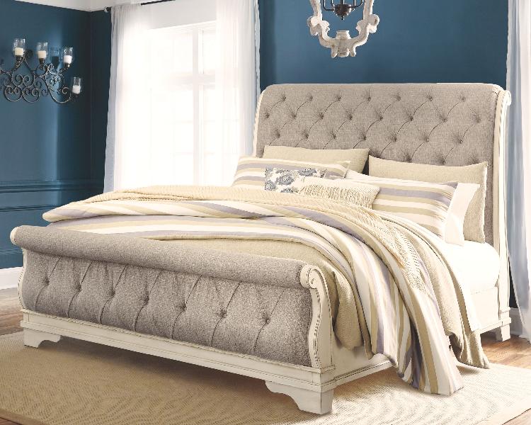 Image of Realyn - California King Upholstered Sleigh Bed - Two-tone