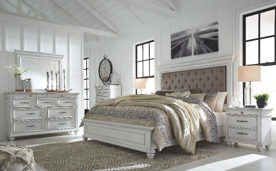Image of Kanwyn - 6 Pc. - Dresser, Mirror, Chest, California King Panel Upholstered Bed - Whitewash